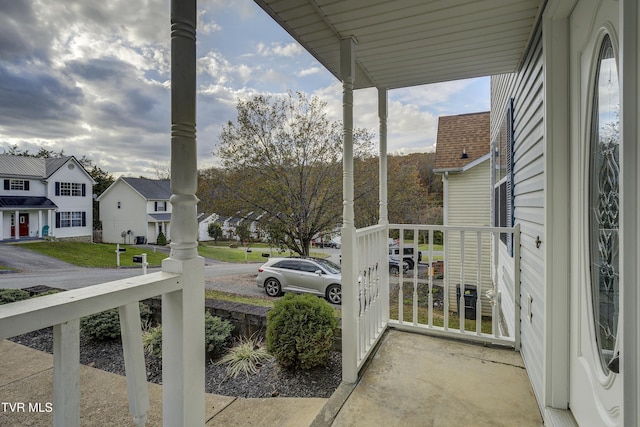 balcony featuring a porch