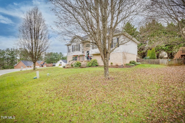 view of front of home with a front yard