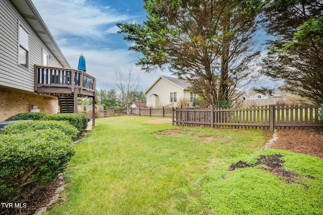 view of yard with a deck