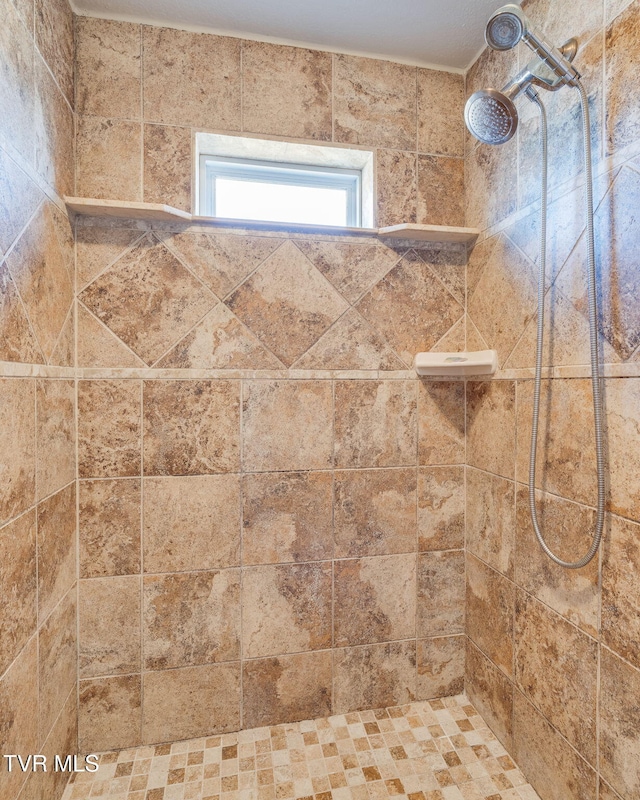 details featuring a tile shower