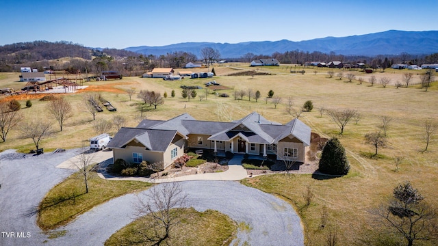 bird's eye view with a rural view and a mountain view