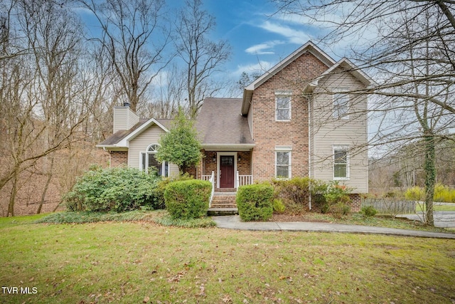 front facade with a front yard