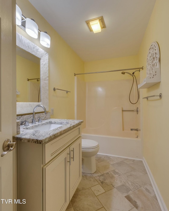 full bathroom featuring vanity, toilet, and tub / shower combination