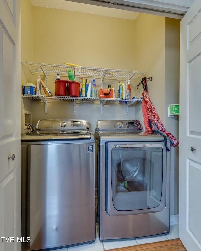 laundry area with washer and dryer