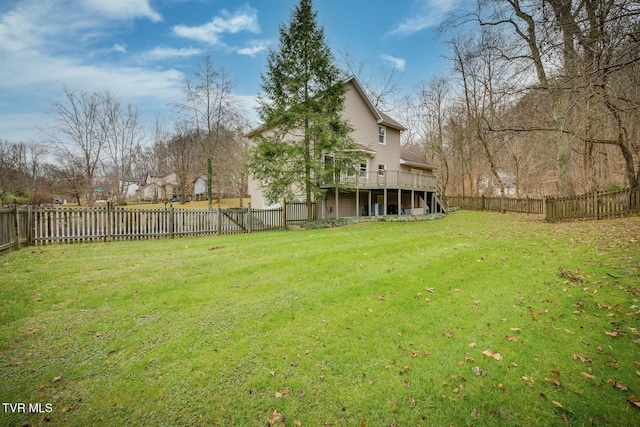 view of yard with a wooden deck