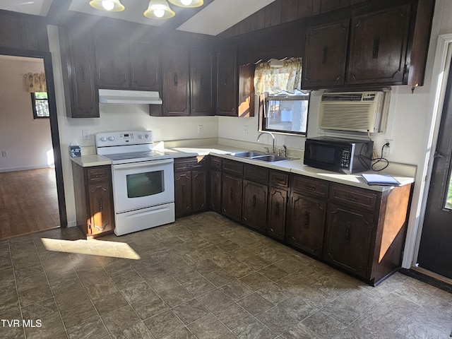 kitchen with electric range, dark brown cabinets, sink, and a wall mounted AC