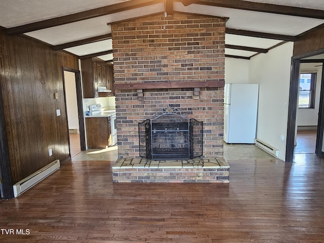 unfurnished living room with hardwood / wood-style flooring, wooden walls, and a baseboard radiator