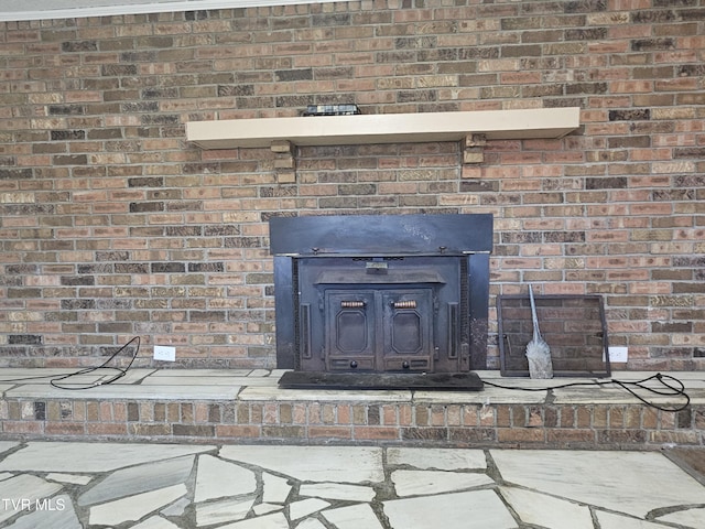 interior details featuring a wood stove