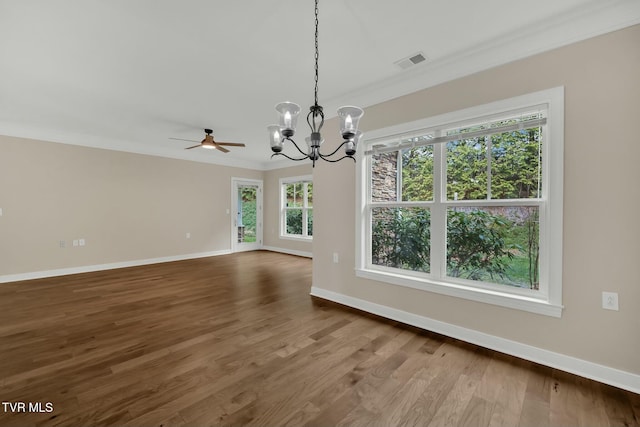 interior space featuring ceiling fan with notable chandelier, wood-type flooring, and ornamental molding