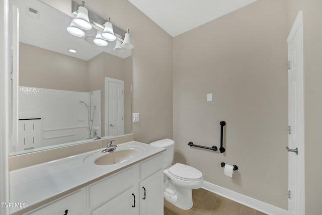 bathroom featuring walk in shower, vanity, and toilet