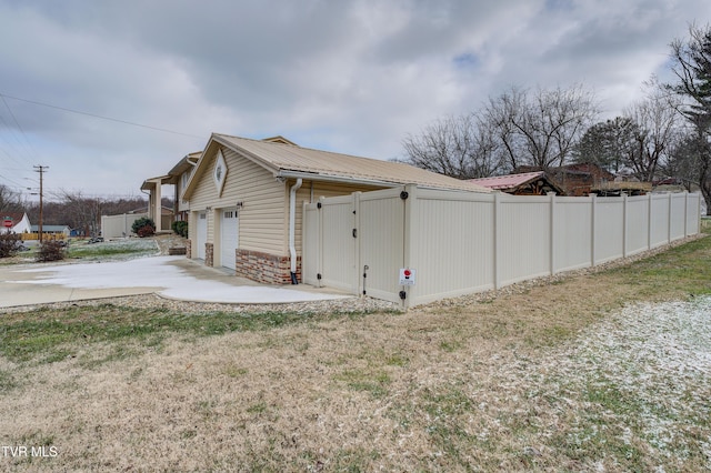 view of home's exterior with a garage