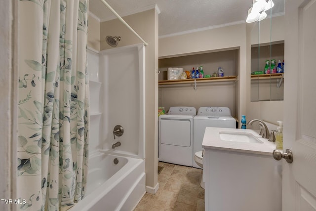 full bathroom featuring shower / bath combo, vanity, a textured ceiling, crown molding, and washing machine and clothes dryer