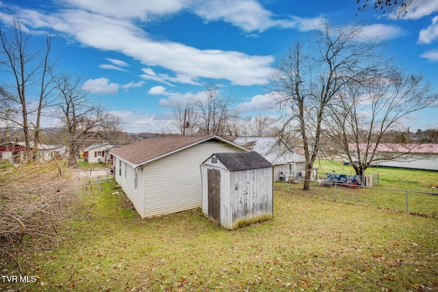 view of outdoor structure with a lawn