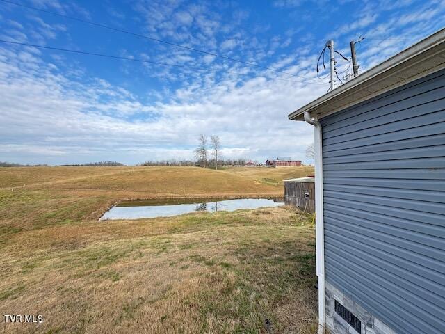 view of yard with a water view