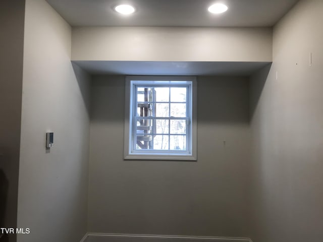 empty room with recessed lighting