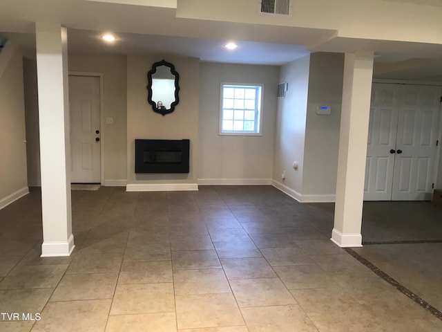 basement with tile patterned flooring