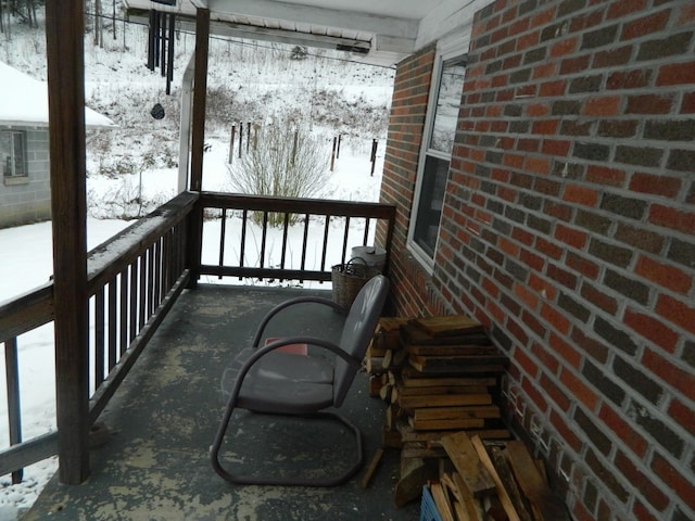 view of snow covered deck