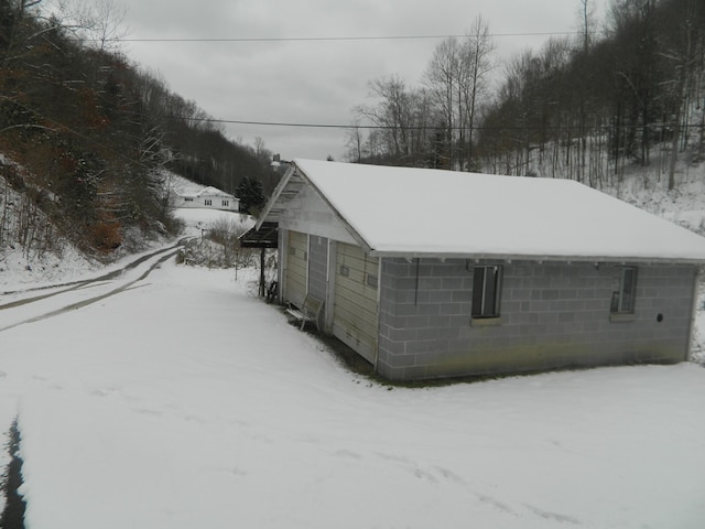 view of snow covered property