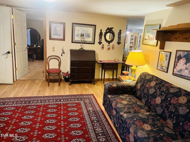 living area with light hardwood / wood-style flooring