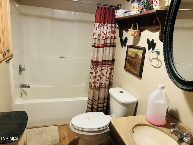 full bathroom with hardwood / wood-style floors, vanity, toilet, and shower / bath combo