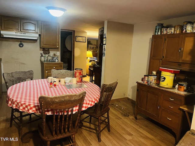 dining room featuring light wood-type flooring