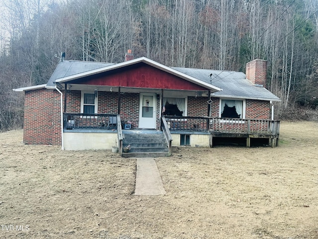 ranch-style home with covered porch