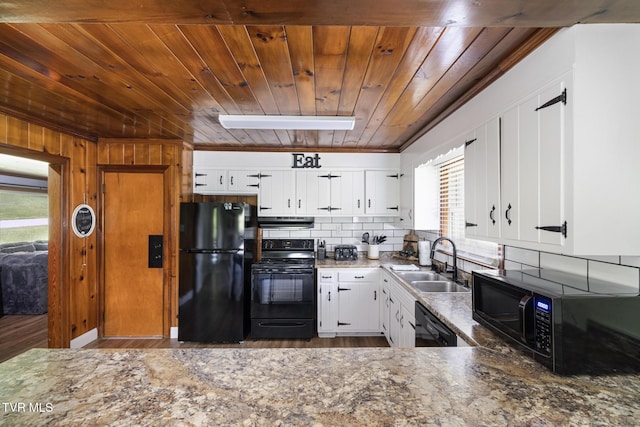 kitchen featuring black appliances, white cabinets, sink, and tasteful backsplash