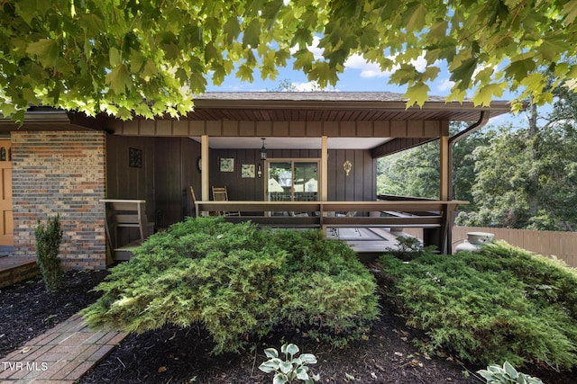 doorway to property with a porch