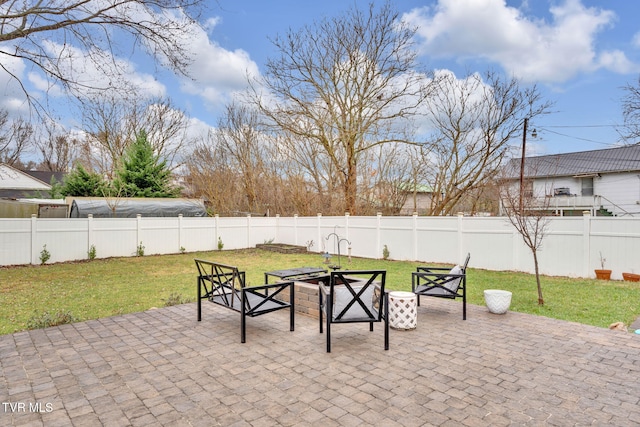 view of patio featuring an outdoor fire pit