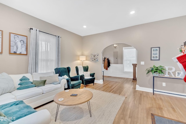 living room with light hardwood / wood-style floors