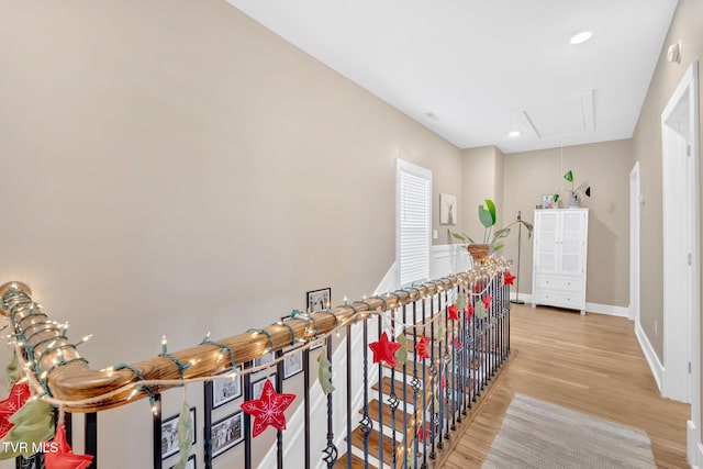 hall with light hardwood / wood-style floors