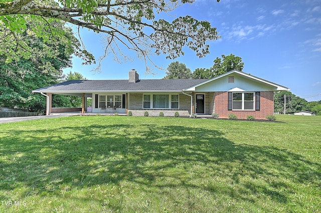 ranch-style house with a carport and a front yard