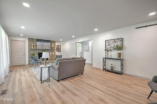 living room with light hardwood / wood-style flooring