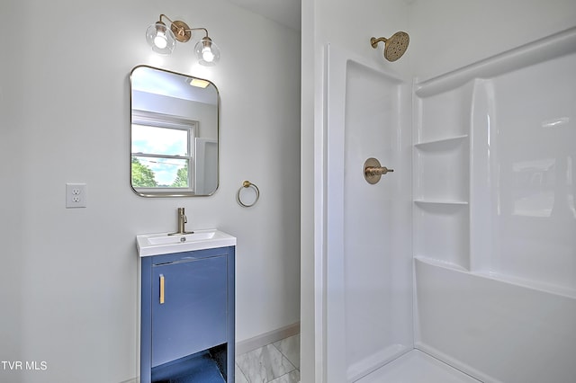 bathroom featuring vanity and walk in shower