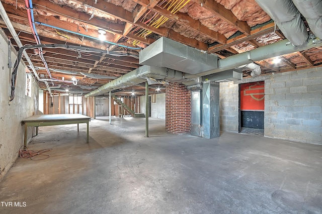 basement featuring heating unit