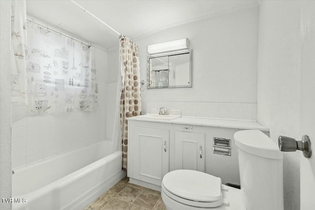 full bathroom with toilet, vanity, and shower / tub combo with curtain