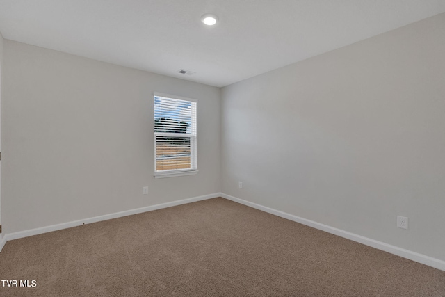 view of carpeted spare room