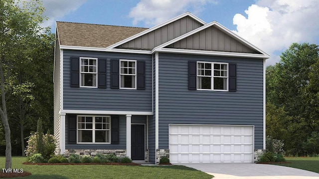 craftsman-style house featuring a garage and a front yard