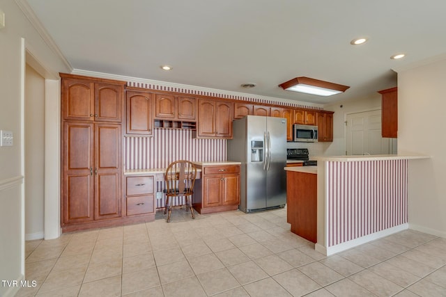 kitchen featuring light tile patterned floors, stainless steel appliances, and ornamental molding