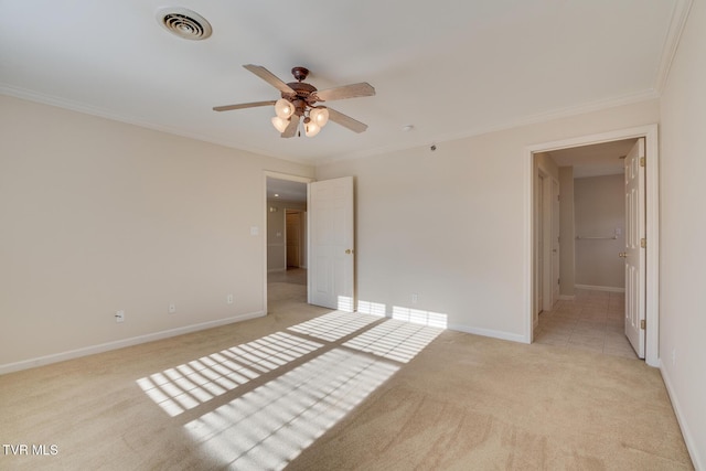 unfurnished bedroom with light carpet, crown molding, and ceiling fan