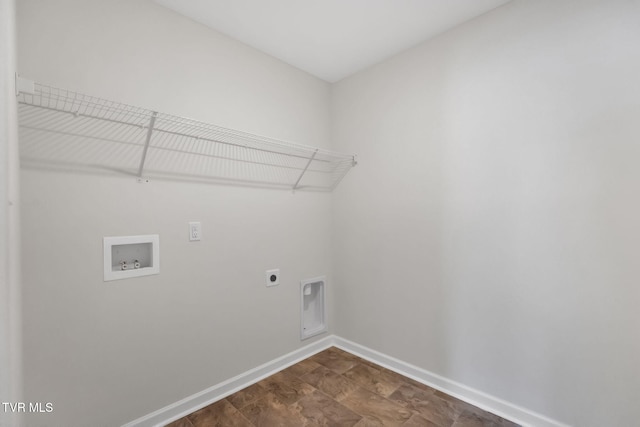 washroom featuring laundry area, washer hookup, electric dryer hookup, and baseboards