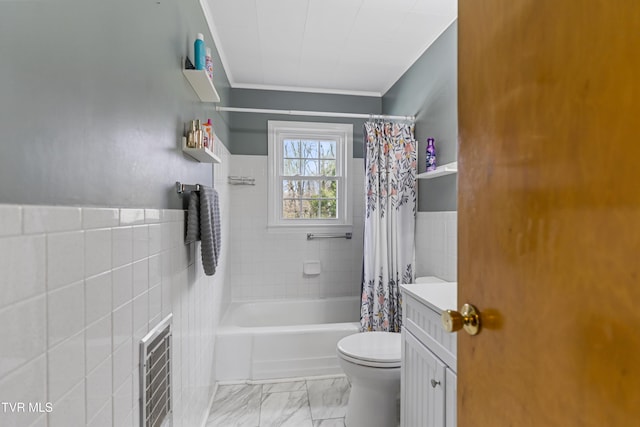 full bathroom with shower / bath combination with curtain, vanity, toilet, and tile walls