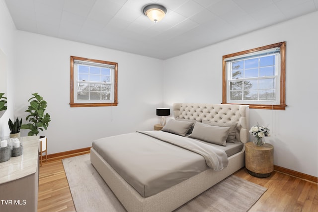 bedroom featuring light hardwood / wood-style floors