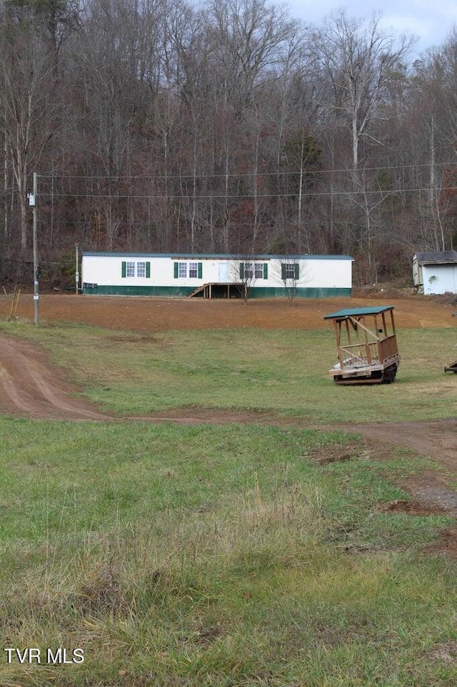 view of community featuring a yard