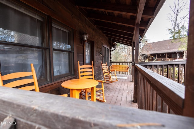 wooden terrace with covered porch