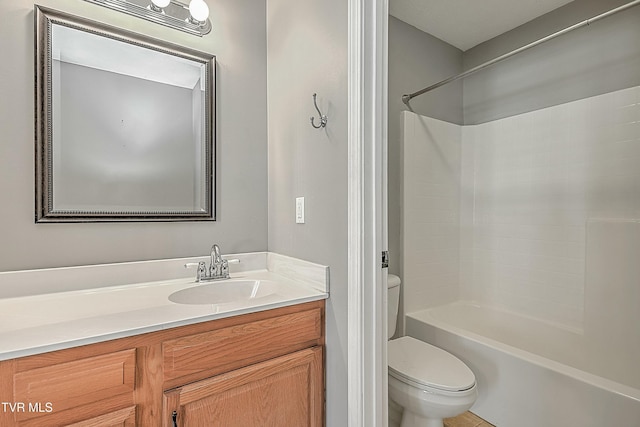 full bathroom with tile patterned flooring, vanity, toilet, and washtub / shower combination