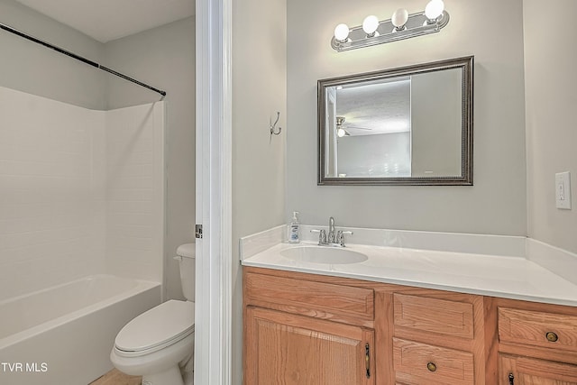 full bathroom with washtub / shower combination, vanity, toilet, and ceiling fan