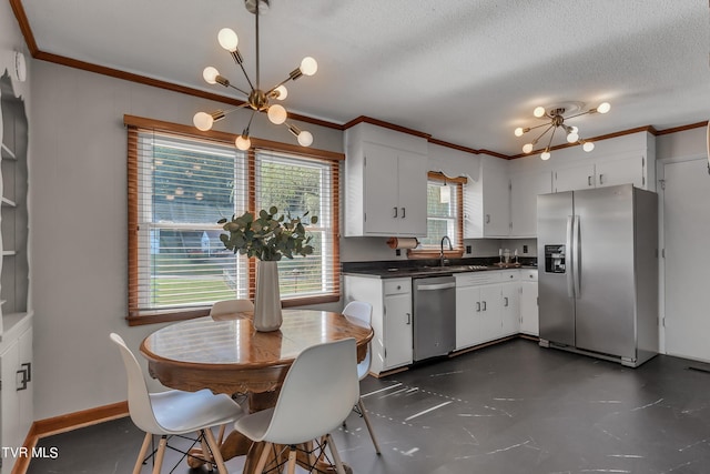 kitchen with white cabinetry, sink, and appliances with stainless steel finishes