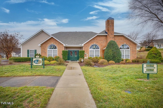 single story home with a front yard