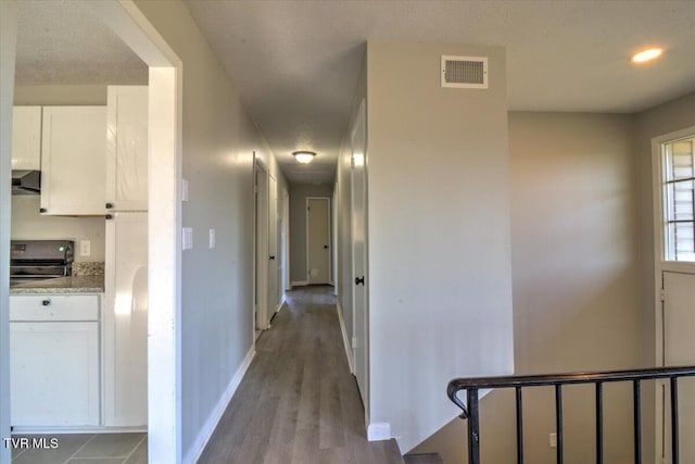 hall featuring light hardwood / wood-style flooring